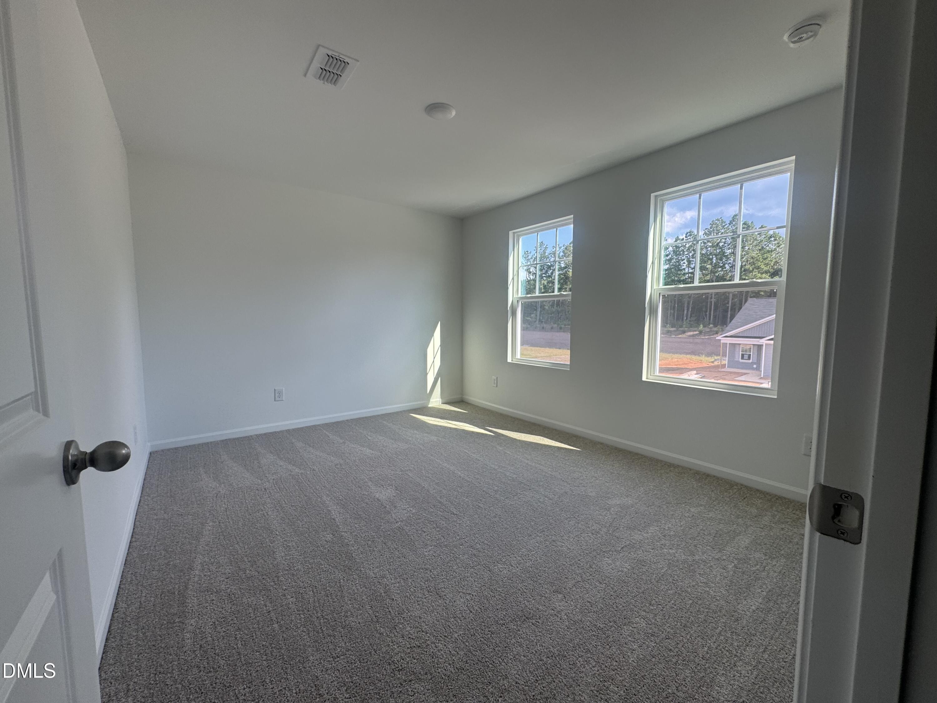 11742 Salers Loop Middlesex, NC 27557 - Photo 12 of 20 an empty room with windows