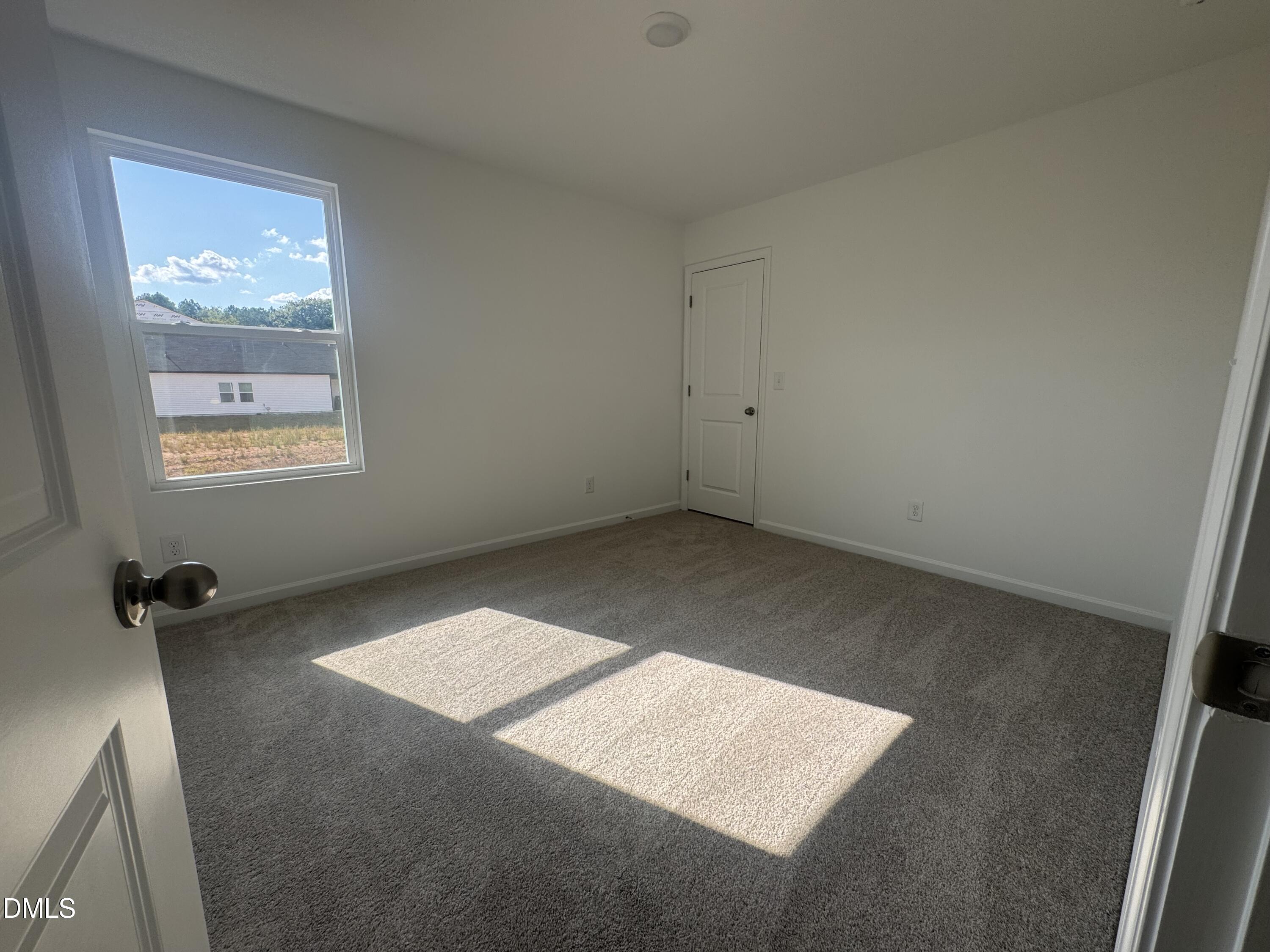 11742 Salers Loop Middlesex, NC 27557 - Photo 15 of 20 a view of an empty room and a window
