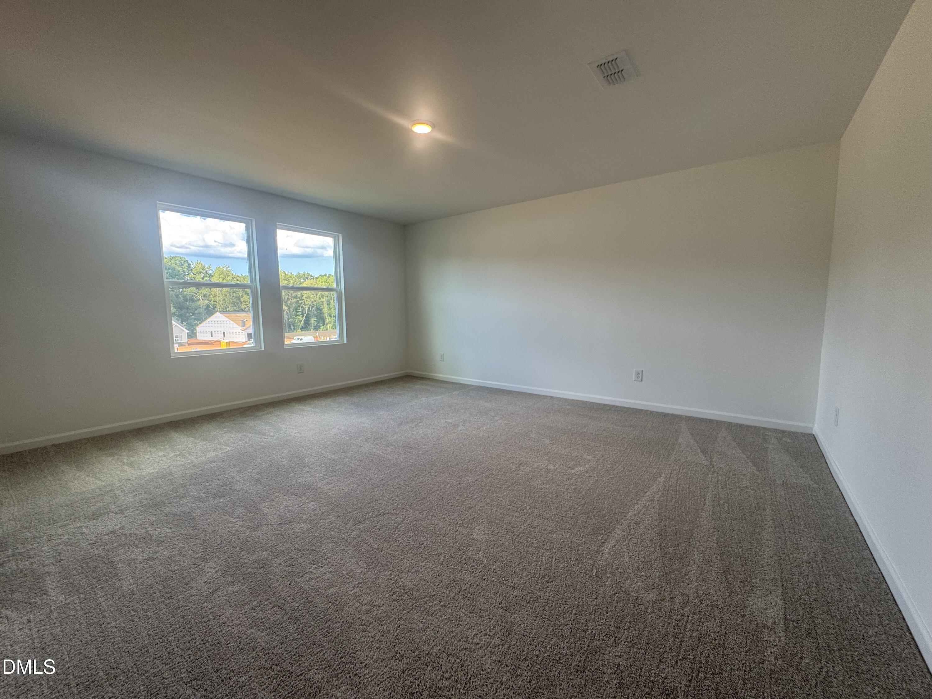 11742 Salers Loop Middlesex, NC 27557 - Photo 16 of 20 an empty room with windows