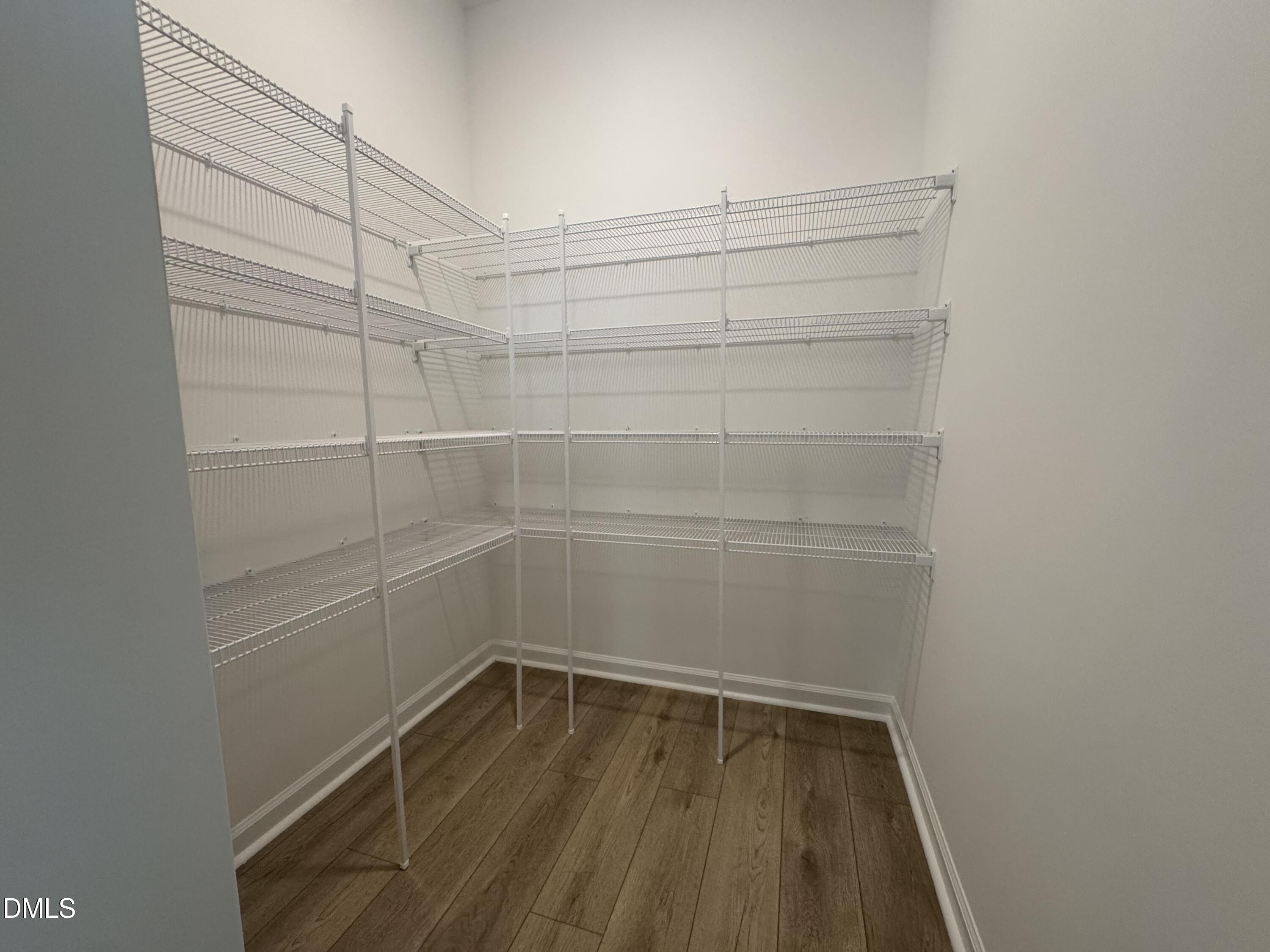 11742 Salers Loop Middlesex, NC 27557 - Photo 8 of 20 a view of a room with empty racks