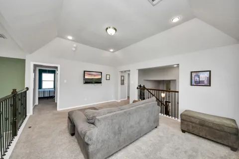 a living room with furniture and a couch