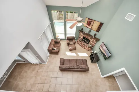 a view of living room with furniture and rug