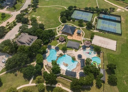 an aerial view of residential house with outdoor space