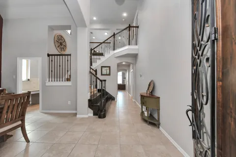 a view of livingroom with furniture and workspace