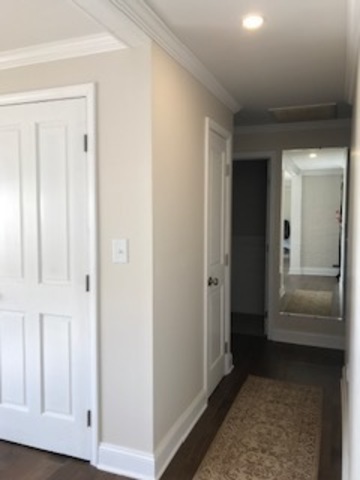19506 West Manhattan Road Elwood, IL 60421 - Photo 14 of 32 a view of a hallway with wooden floor