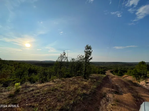 a view of a houses with a yard