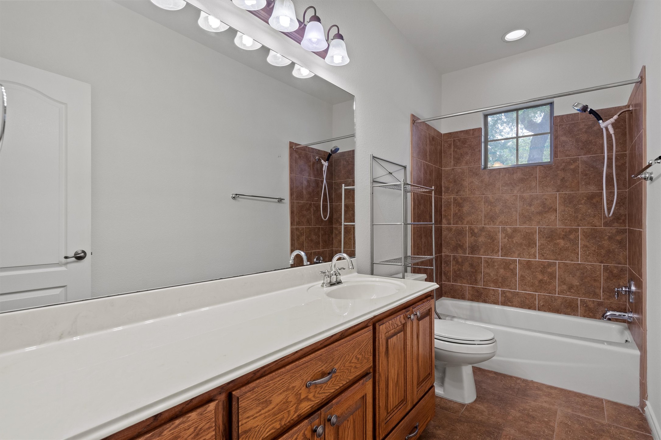 4612 Sonora Trace Georgetown, TX 78633 - Photo 30 of 36 a bathroom with a sink a toilet and shower