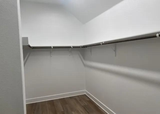 a view of an empty walk in closet