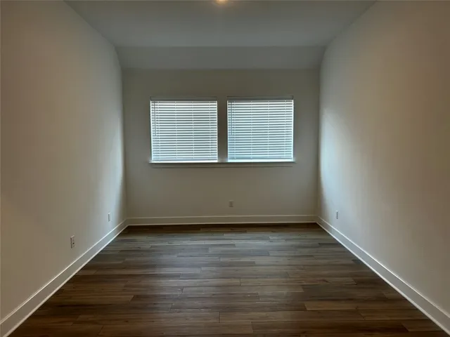 a large kitchen with stainless steel appliances granite countertop a large counter top and a stove