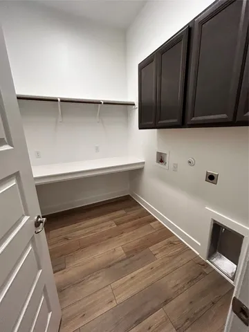 a large kitchen with stainless steel appliances granite countertop a large counter top and a stove