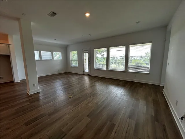 a bathroom with a double vanity sink mirror and shower