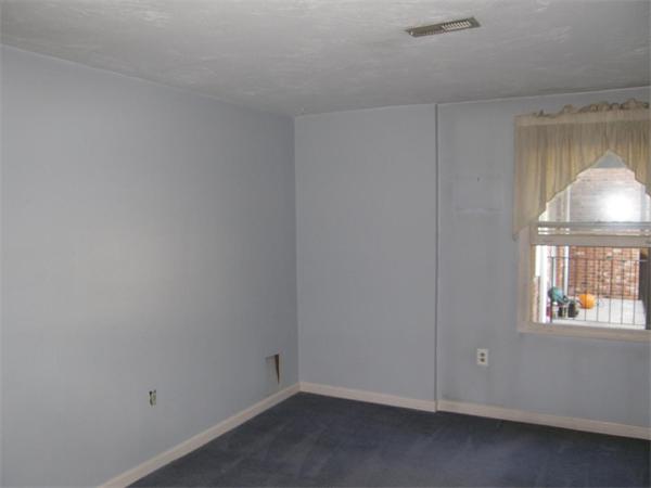 356 Neponset Street, Unit E Canton, MA 02021 - Photo 7 of 8 an empty room with a window