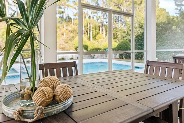 a view of a house with sitting area and furniture