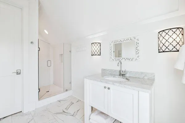 a bathroom with a sink a washer and dryer