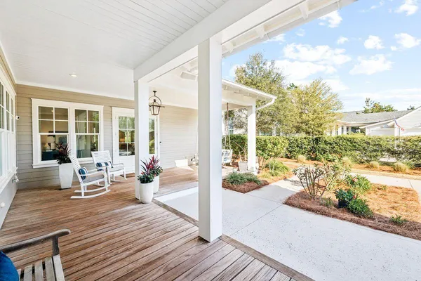 a outdoor space with patio the couches and a dining table with garden view