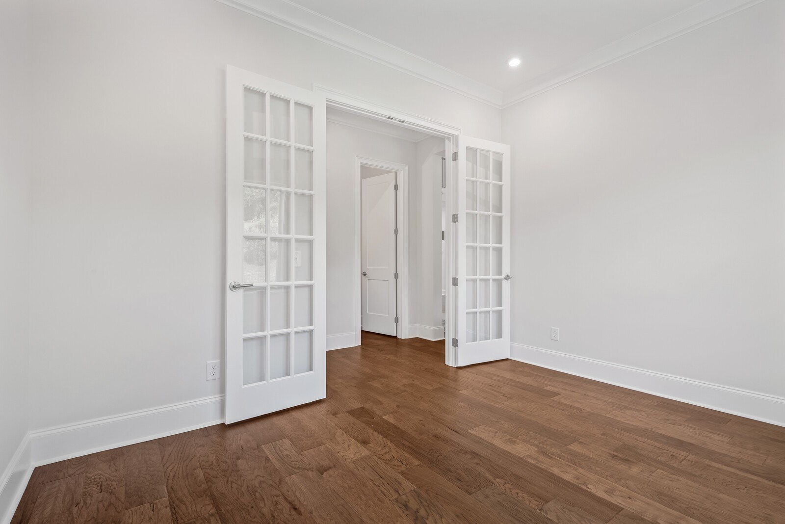 7244 Murrel Drive Franklin, TN 37064 - Photo 11 of 57 an empty room with wooden floor