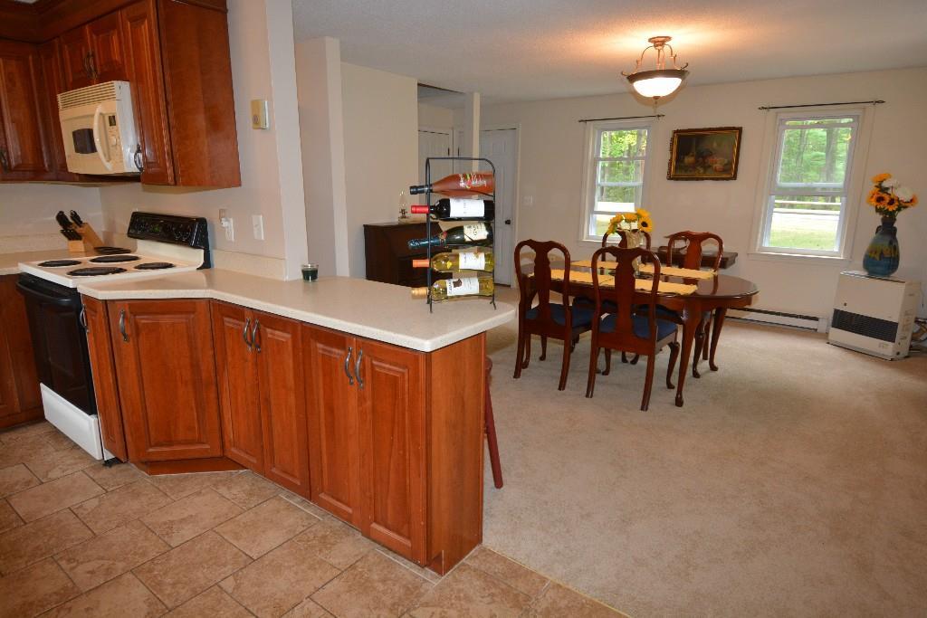 34 Winnocks Neck Road Scarborough, ME 04074 - Photo 4 of 35 Open kitchen and dining room....