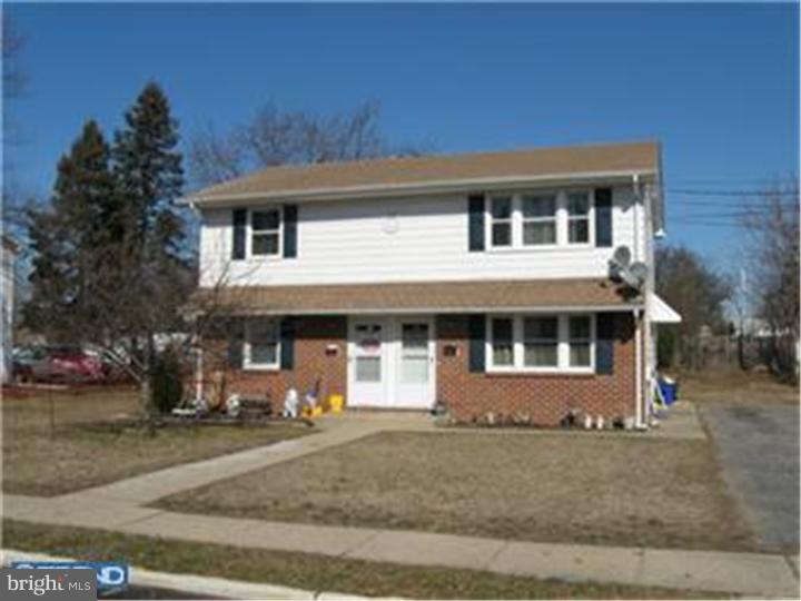 605-607 Filmore Street Riverside, NJ 08075 - Photo 1 of 7 a front view of a house with a yard