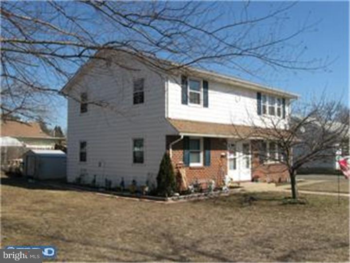 605-607 Filmore Street Riverside, NJ 08075 - Photo 2 of 7 a front view of a house with a yard