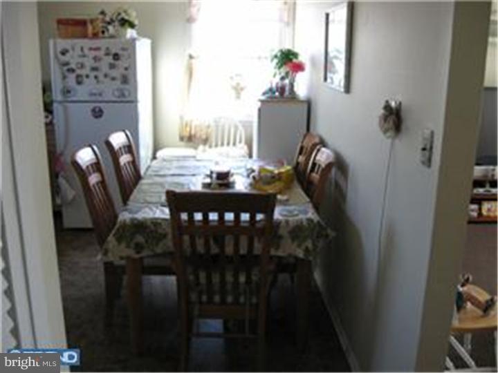605-607 Filmore Street Riverside, NJ 08075 - Photo 5 of 7 a dining room with furniture and window