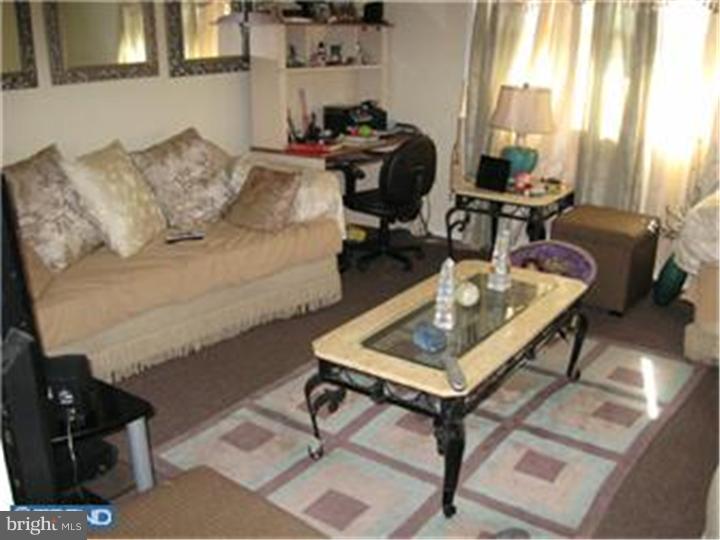 605-607 Filmore Street Riverside, NJ 08075 - Photo 6 of 7 a living room with furniture and a piano