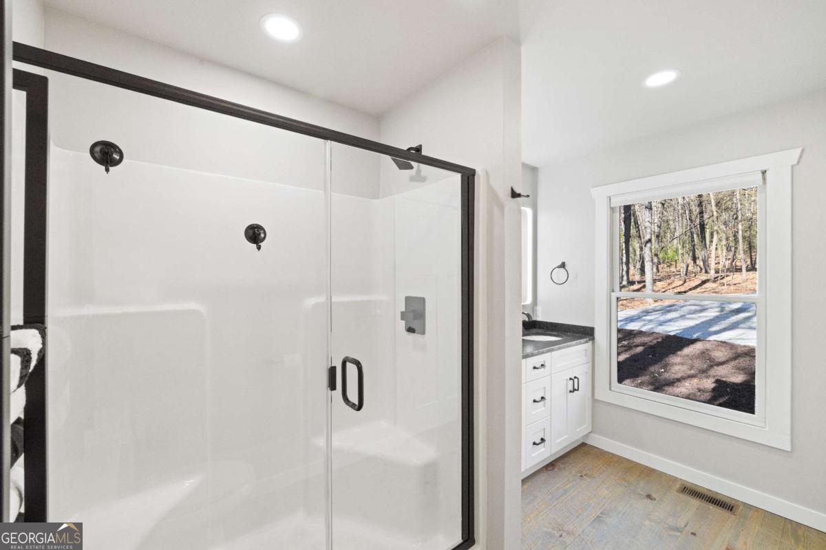 292 Wits End Way Cherry Log, GA 30522 - Photo 11 of 32 a bathroom with a shower