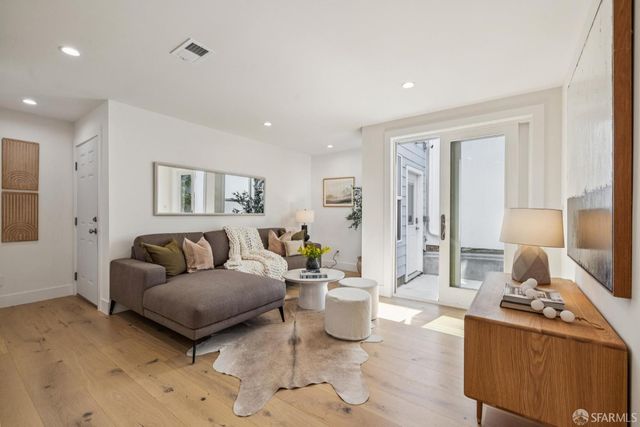 a bathroom with a sink vanity and mirror