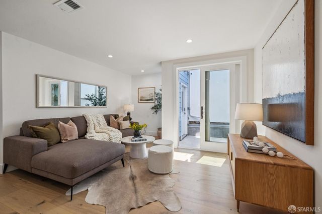 a utility room with sink dryer and washer