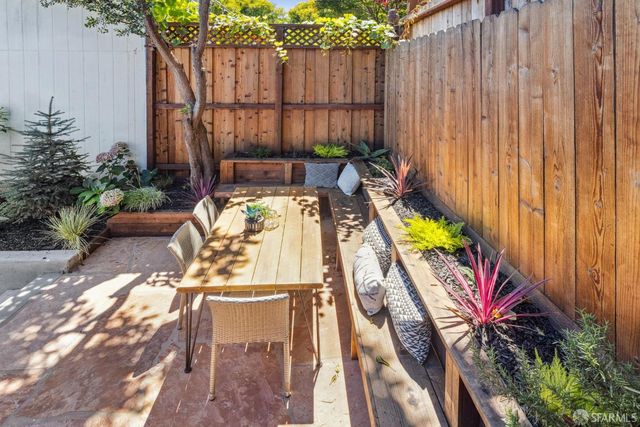 a view of swimming pool with a patio