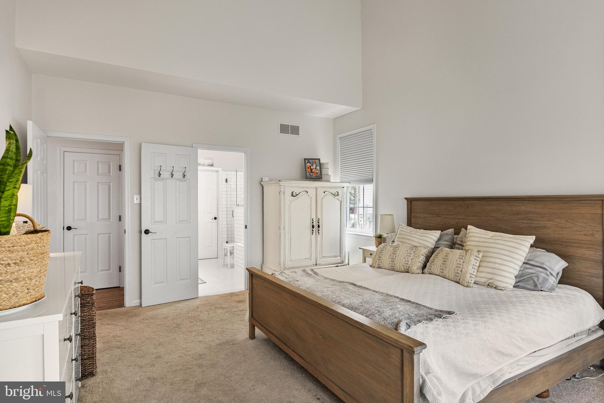 6 Augusta Drive Westampton, NJ 08060 - Photo 16 of 31 a spacious bedroom with a bed and a couch