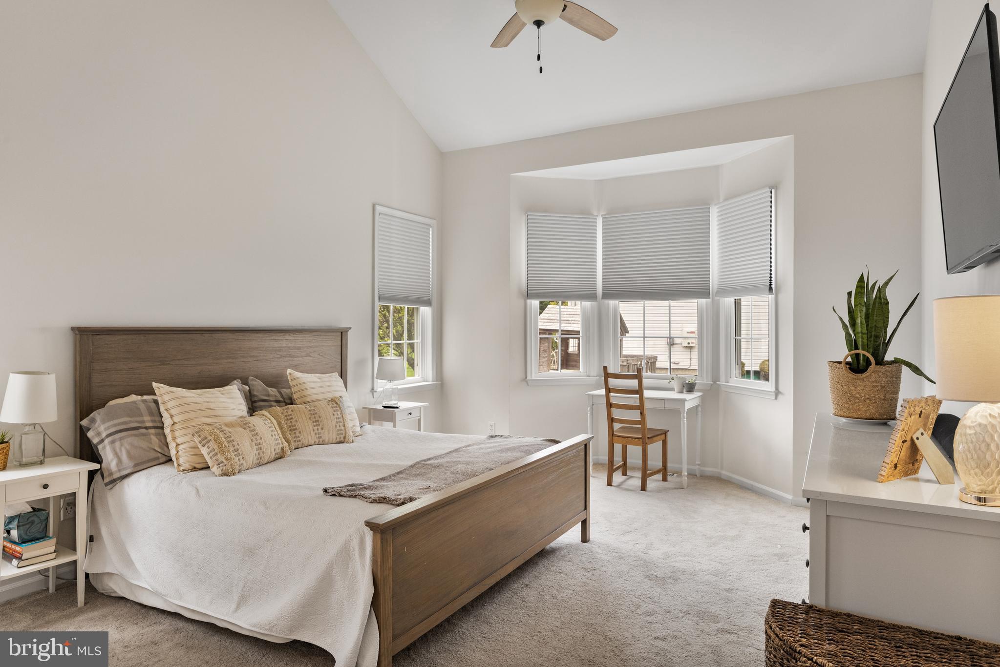 6 Augusta Drive Westampton, NJ 08060 - Photo 17 of 31 a spacious bedroom with a bed and a table in it