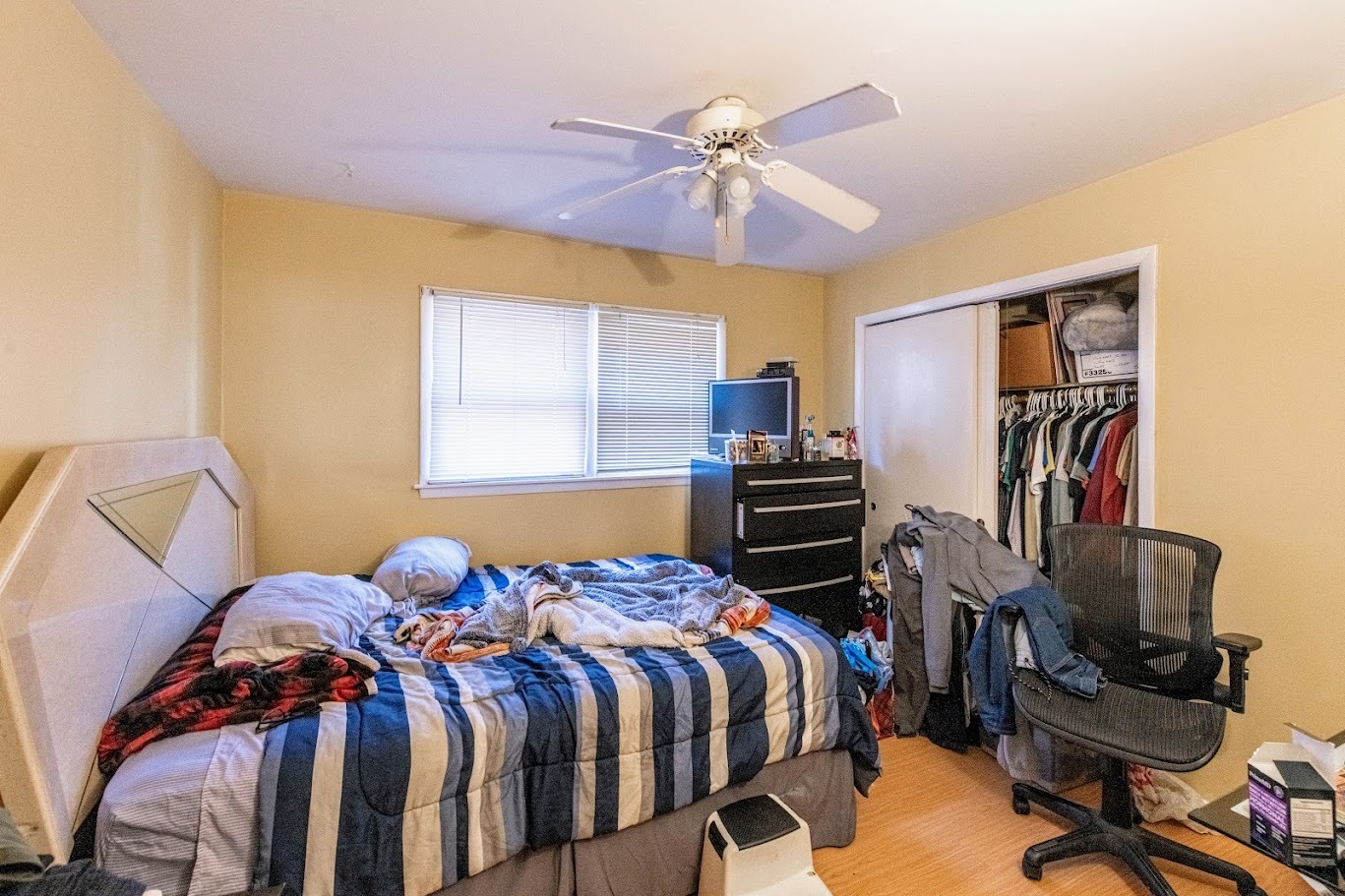 1617 35th Avenue Melrose Park, IL 60160 - Photo 20 of 38 a bedroom with a bed and a book shelf