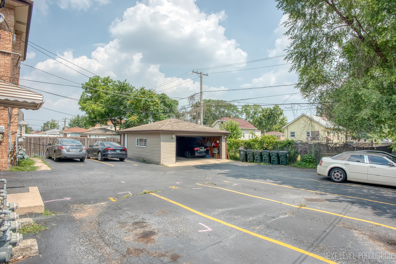 1617 35th Avenue Melrose Park, IL 60160 - Photo 34 of 38 a car parked in front of a house