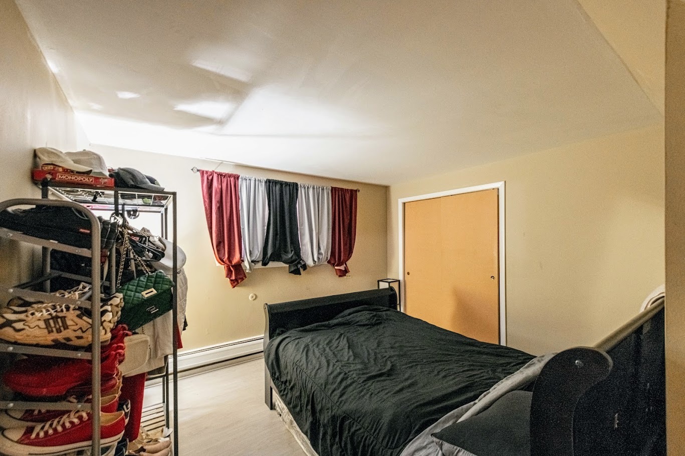 1617 35th Avenue Melrose Park, IL 60160 - Photo 10 of 38 a bedroom with a bed and a flat screen tv