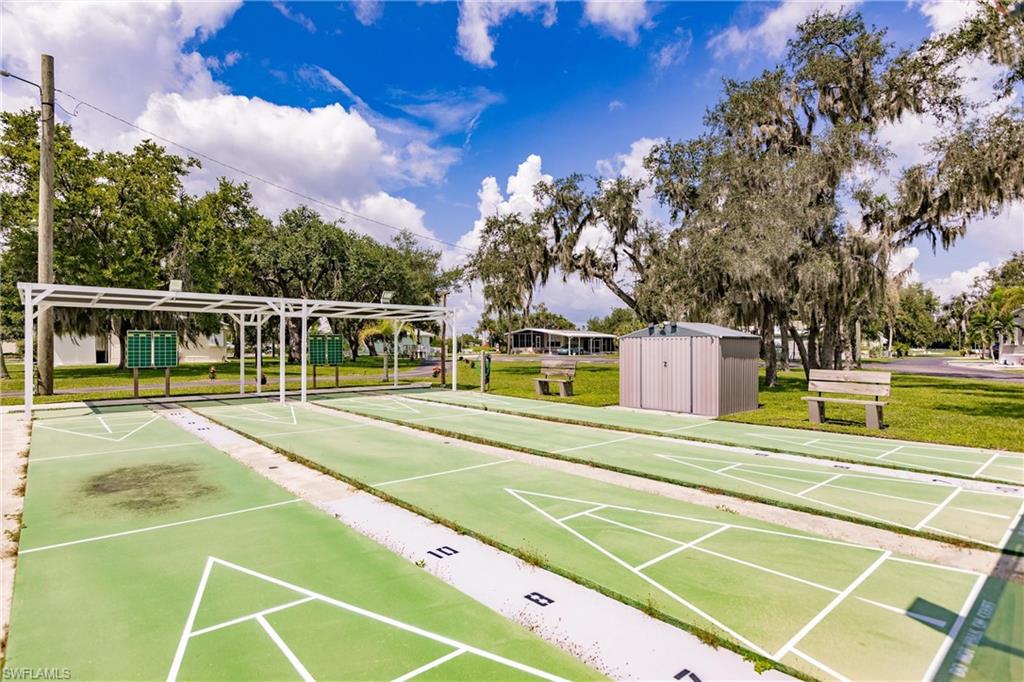 10100 Burnt Store Road, Unit 104 Punta Gorda, FL 33950 - Photo 35 of 46 View of property's community shuffleboard