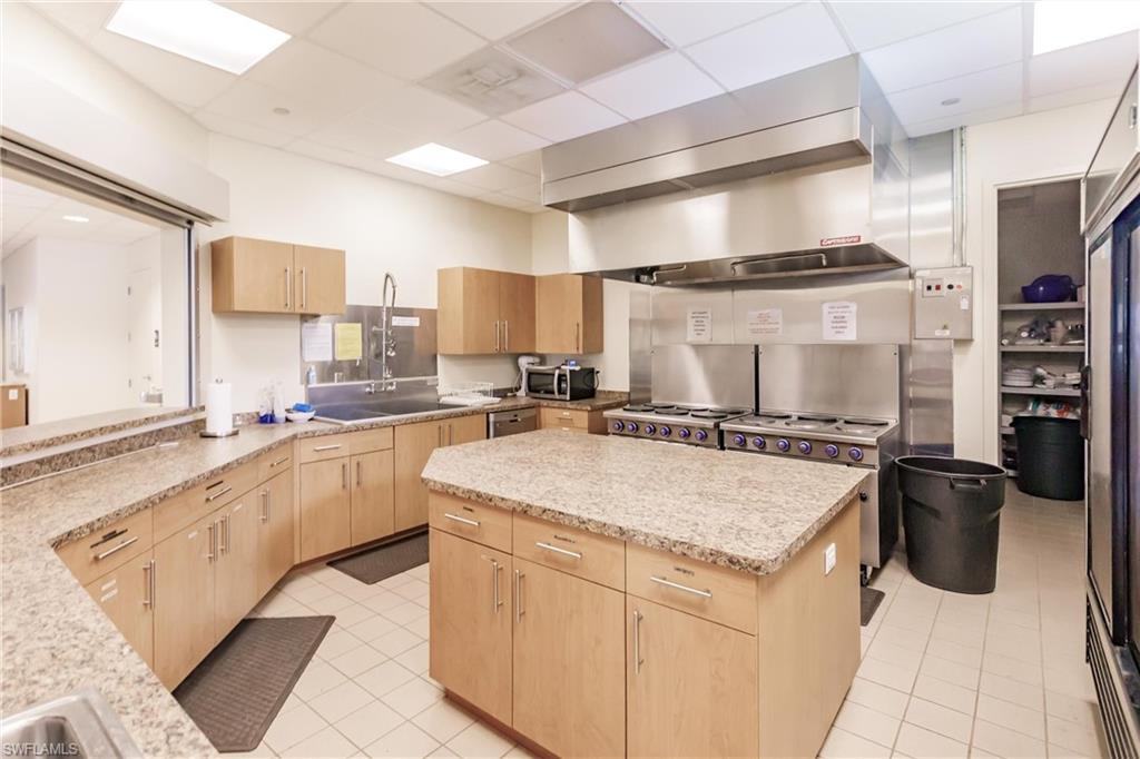 10100 Burnt Store Road, Unit 104 Punta Gorda, FL 33950 - Photo 40 of 46 Commercial kitchenfor events at Haven Hall