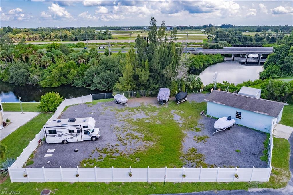 10100 Burnt Store Road, Unit 104 Punta Gorda, FL 33950 - Photo 46 of 46 Drone / aerial view featuring community storage area