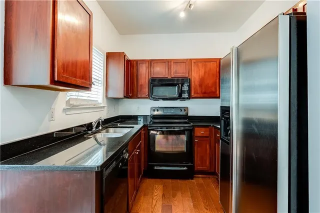 a bed room with a bed window and a couch