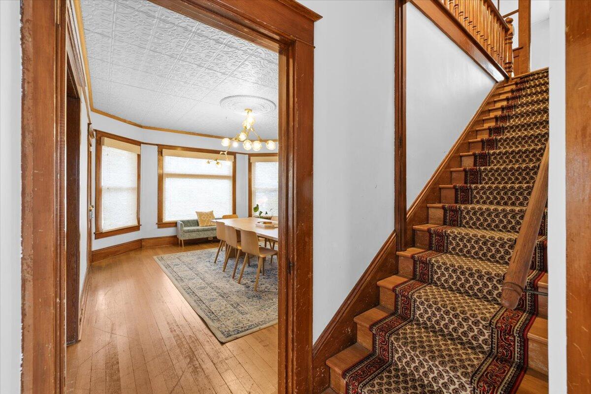 139 Southwest I Street Grants Pass, OR 97526 - Photo 28 of 47 a view of an entryway with wooden floor and stairs