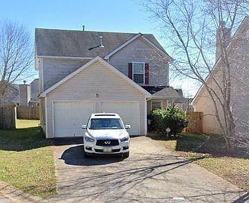 2009 Rolling Meadows Road Villa Rica, GA 30180 - Photo 1 of 1 a car parked in front of a house