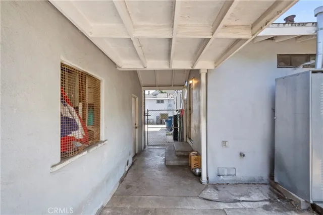 a view of a house with a snow in the yard