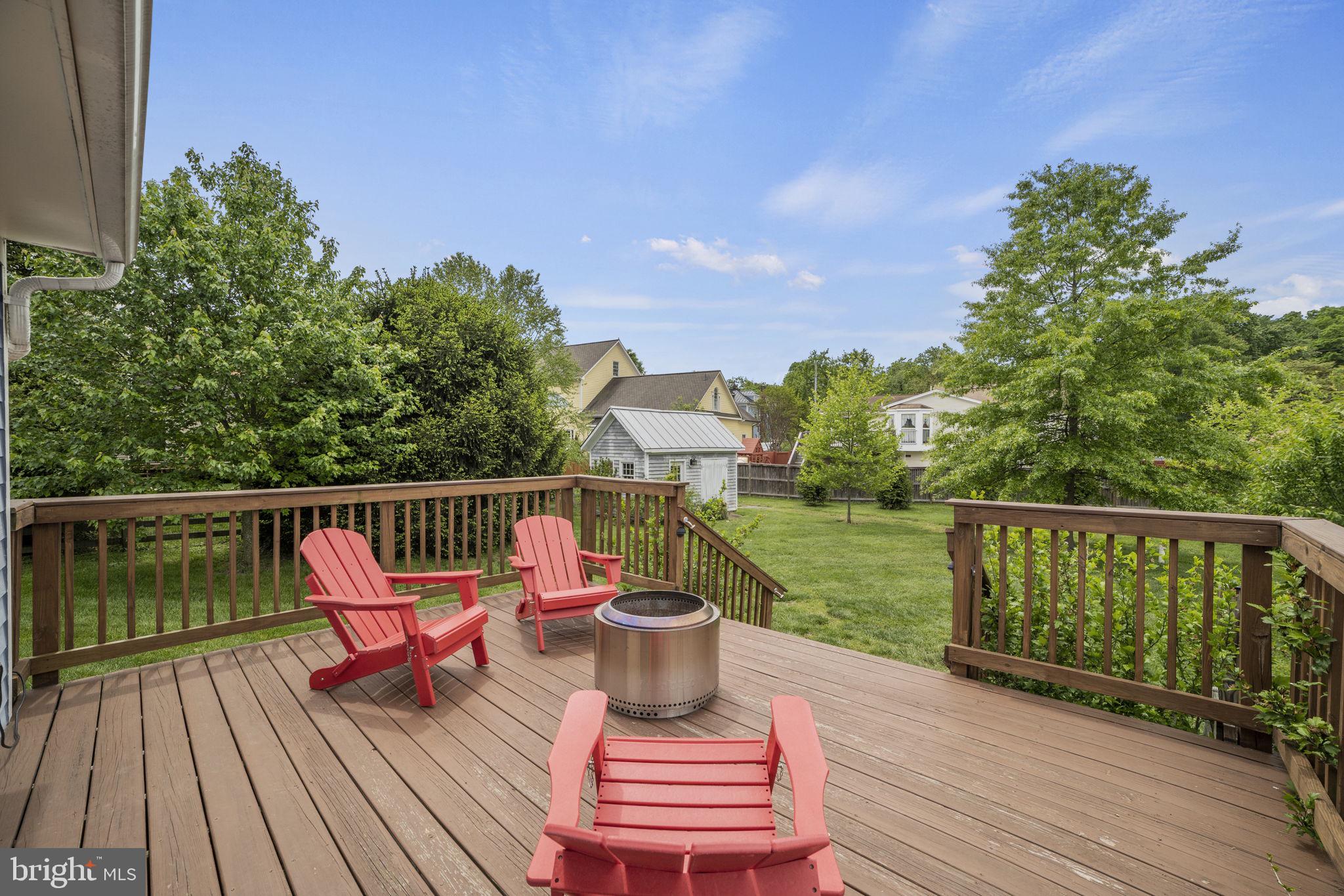 705 Dranesville Road Herndon, VA 20170 - Photo 22 of 22 Charming deck with serene views.
