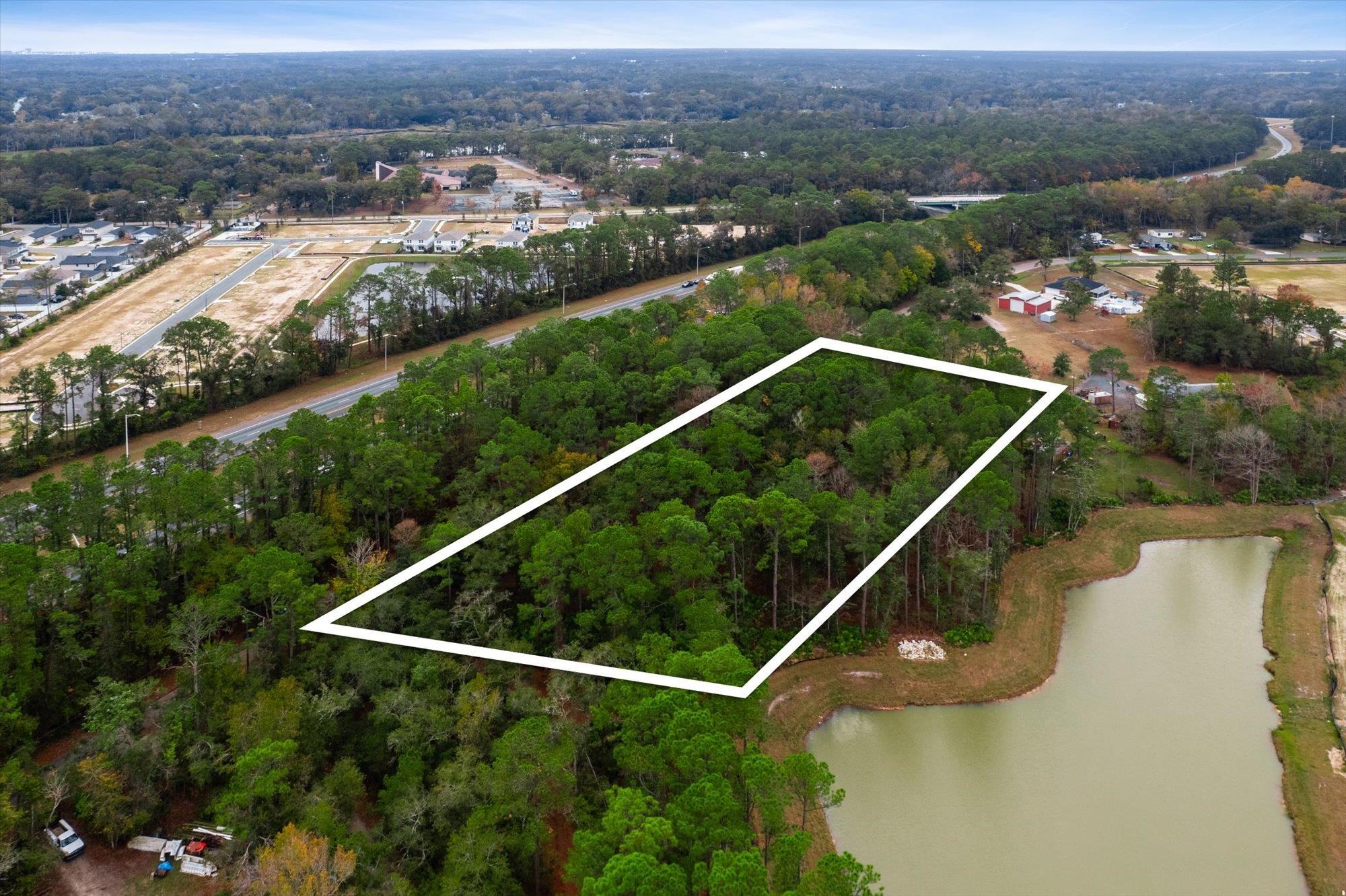 0 Splendora Lane Jacksonville, FL 32219 - Photo 12 of 17 an aerial view of residential houses with outdoor space and river