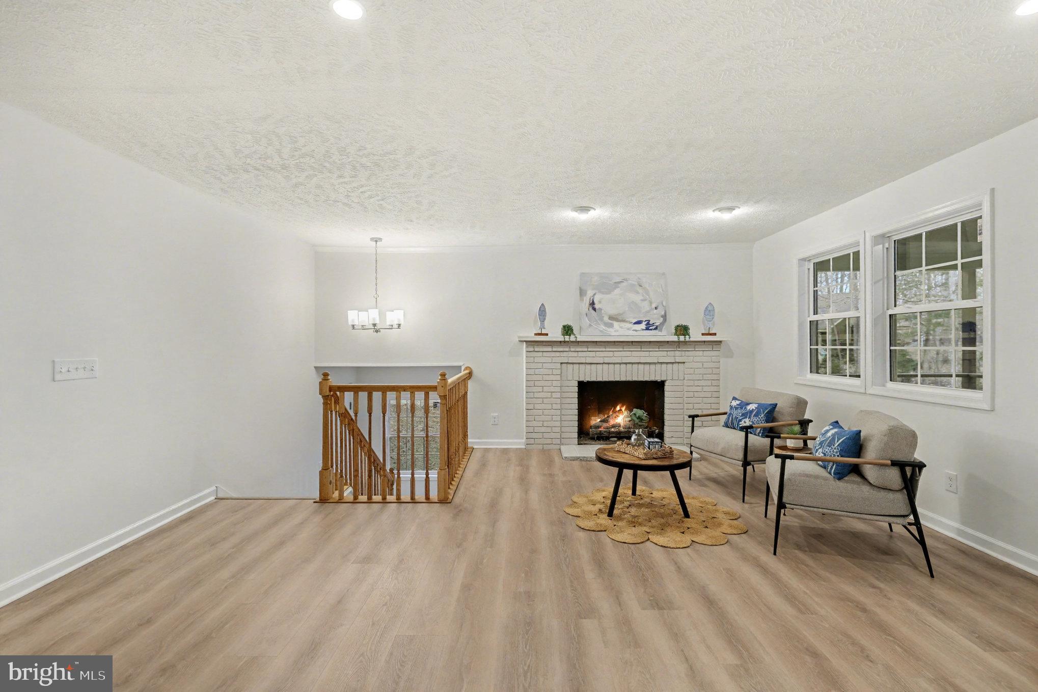 305 Green Street Locust Grove, VA 22508 - Photo 11 of 25 a view of a livingroom with furniture and a fireplace