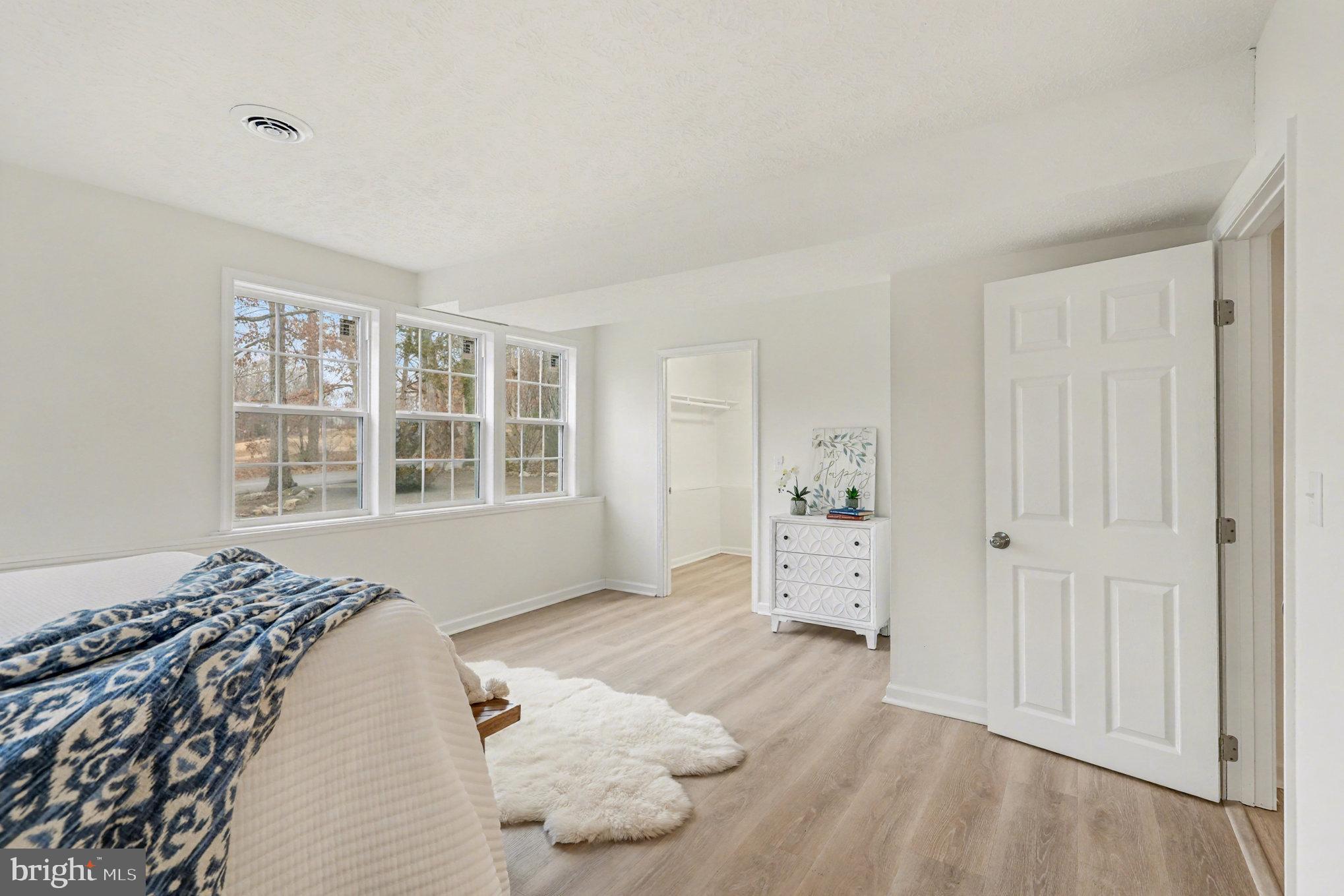 305 Green Street Locust Grove, VA 22508 - Photo 15 of 25 a bedroom with a bed and a window