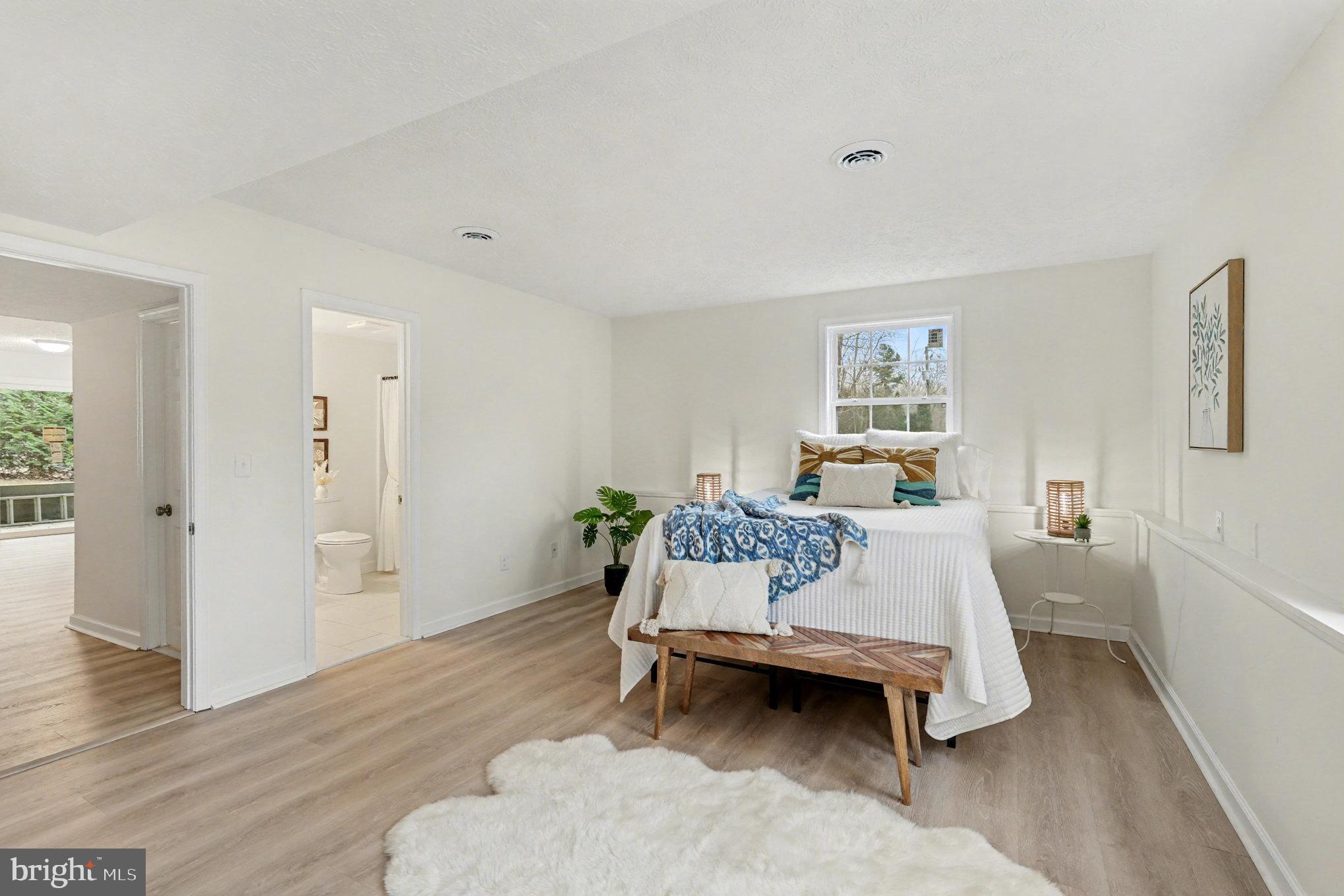 305 Green Street Locust Grove, VA 22508 - Photo 17 of 25 a living room with furniture and a wooden floor