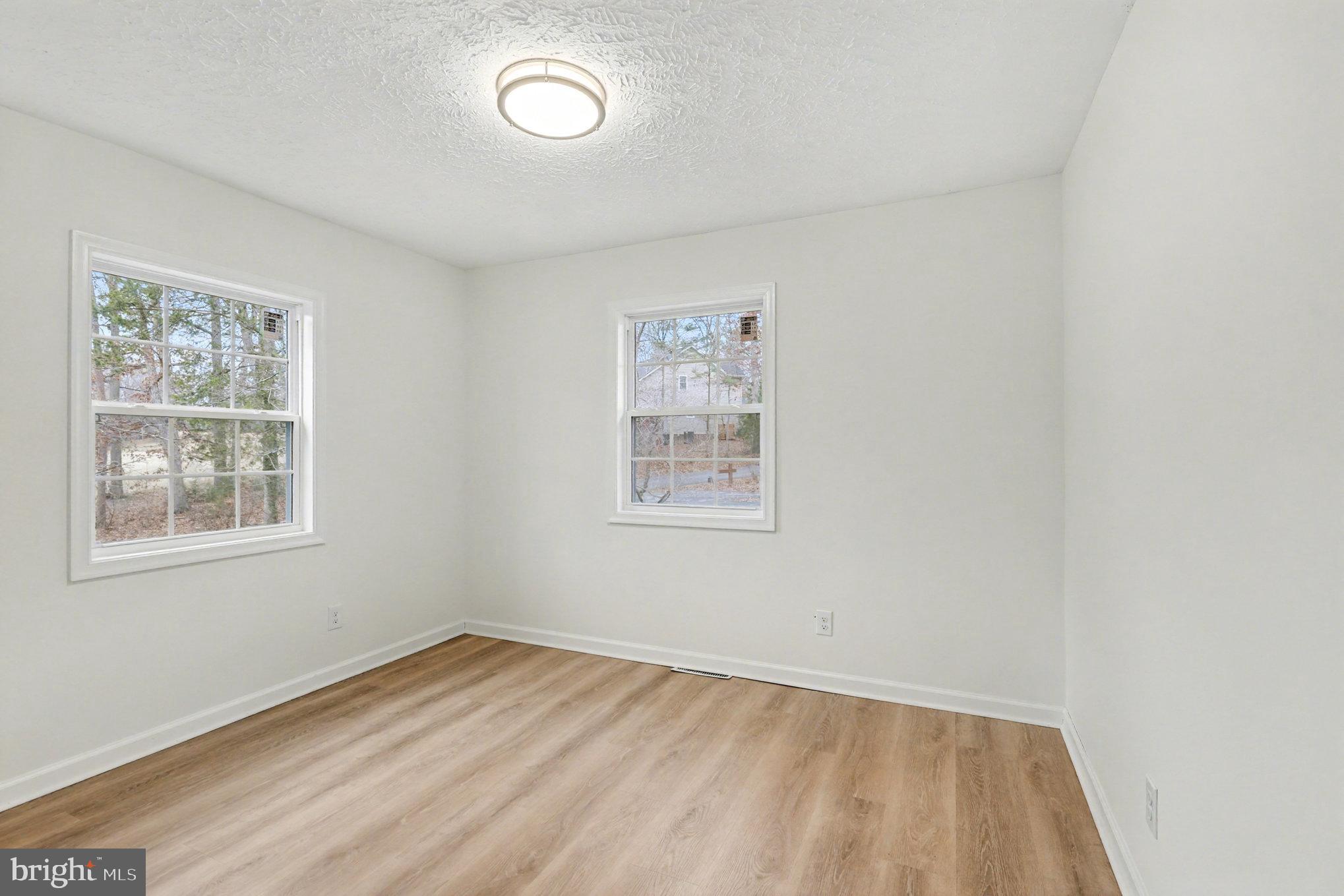 305 Green Street Locust Grove, VA 22508 - Photo 19 of 25 an empty room with a window