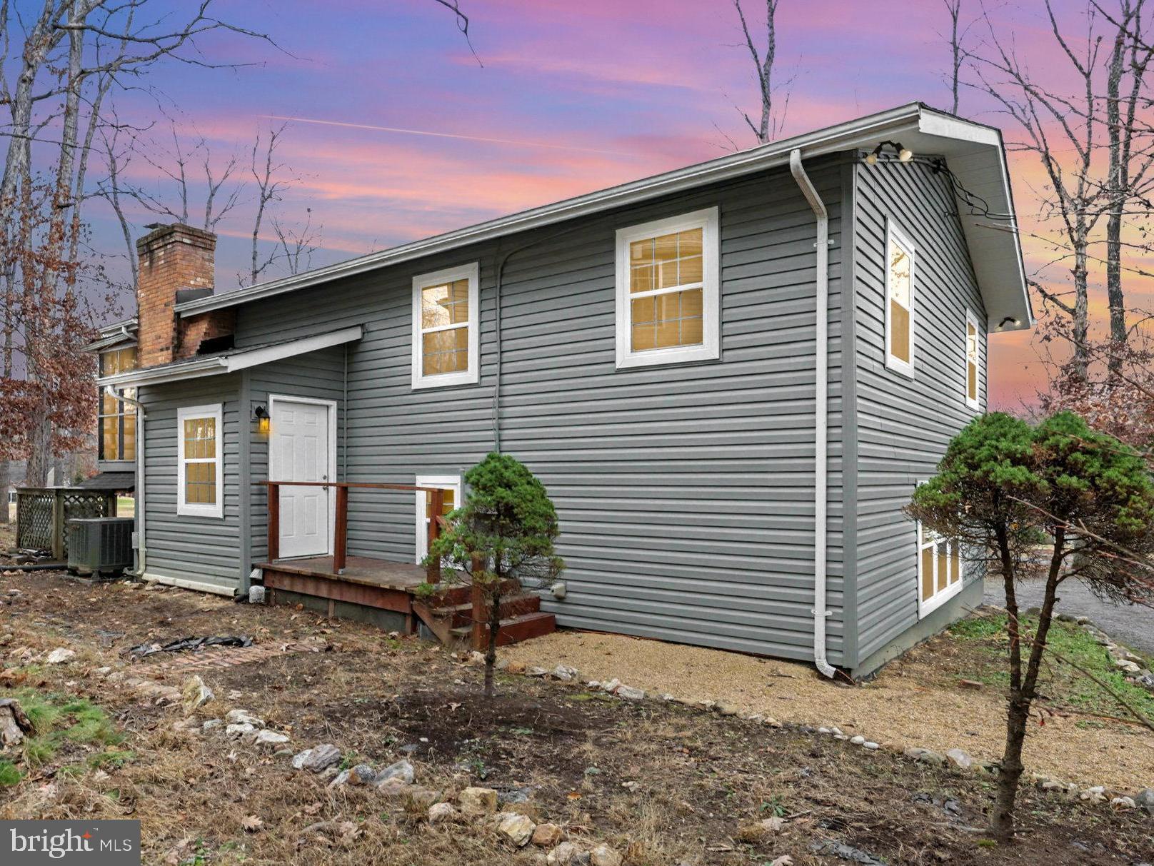 305 Green Street Locust Grove, VA 22508 - Photo 24 of 25 a front view of a house with garden