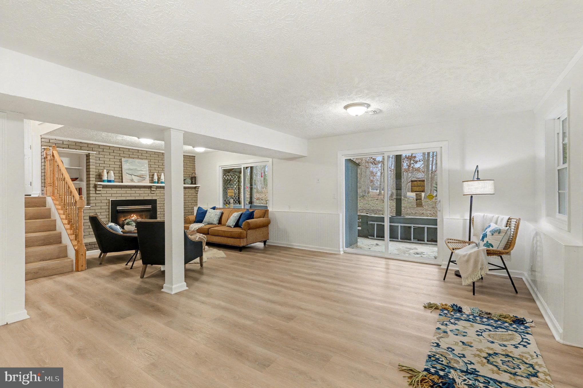 305 Green Street Locust Grove, VA 22508 - Photo 5 of 25 a living room with furniture and a fireplace