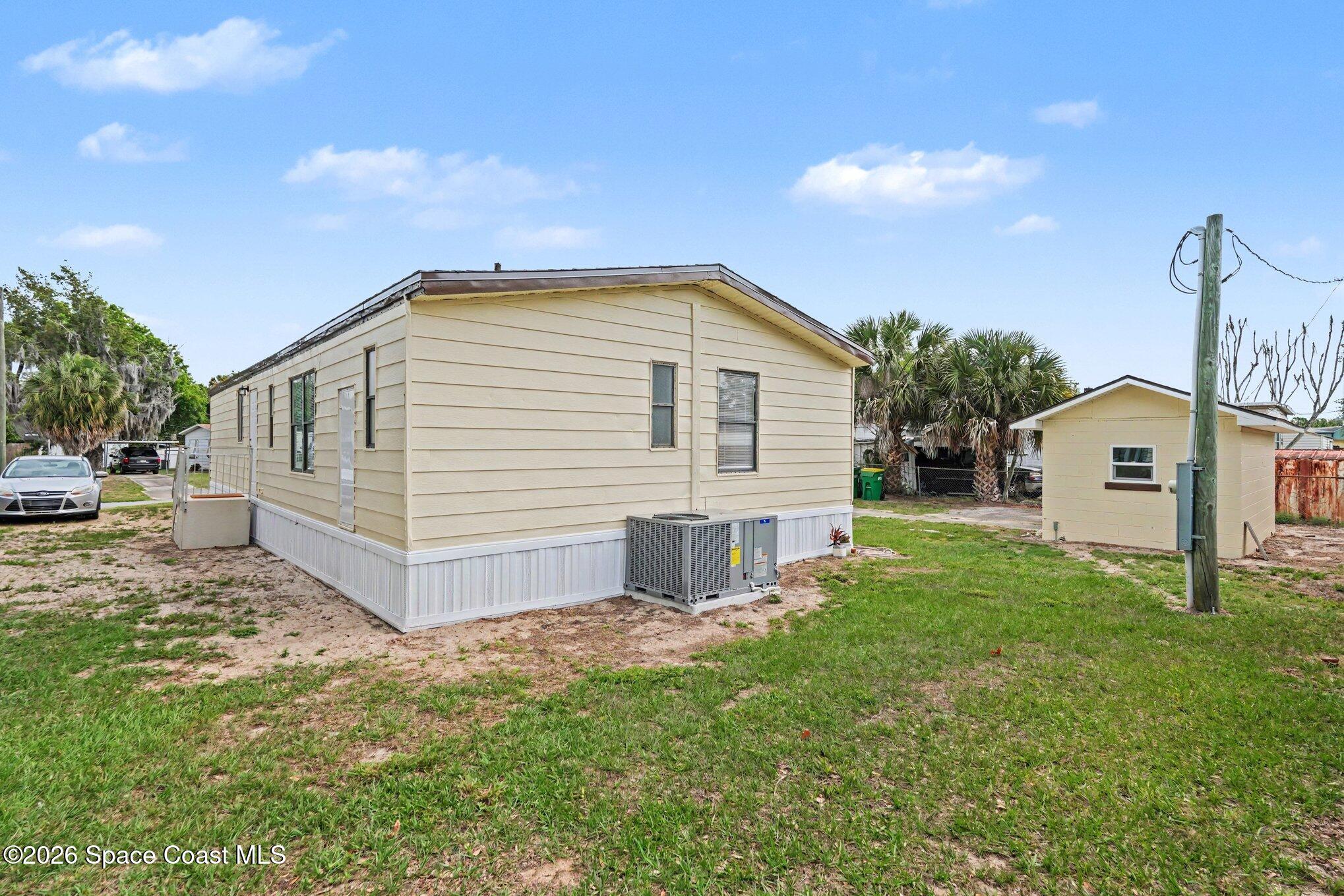 604 Breezeway Drive Cocoa, FL 32926 - Photo 25 of 26 Yard and shed view
